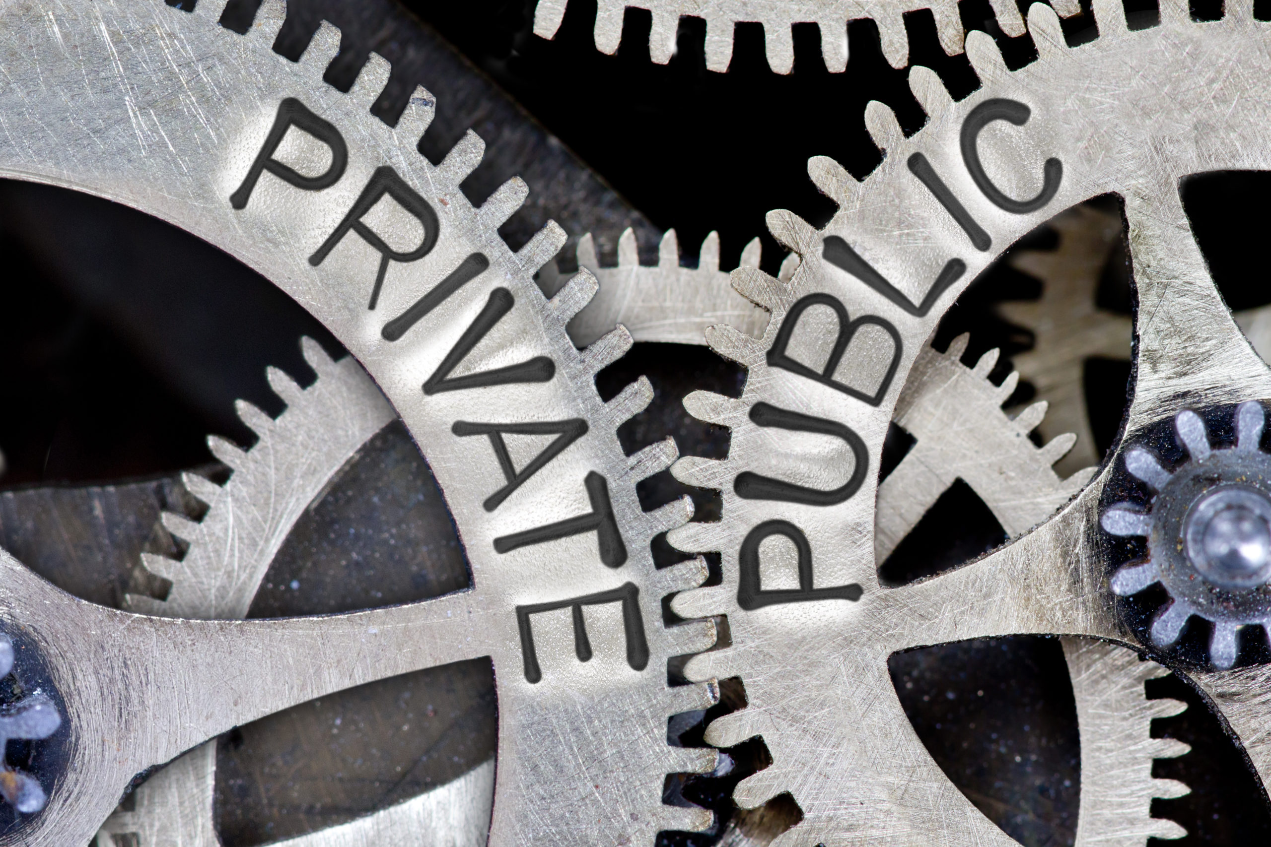 Macro,Photo,Of,Tooth,Wheel,Mechanism,With,Arrows,And,Private,