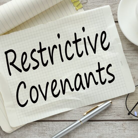 Restrictive,Covenants,On,A,Wooden,Background,,A,Notepad,With,Text